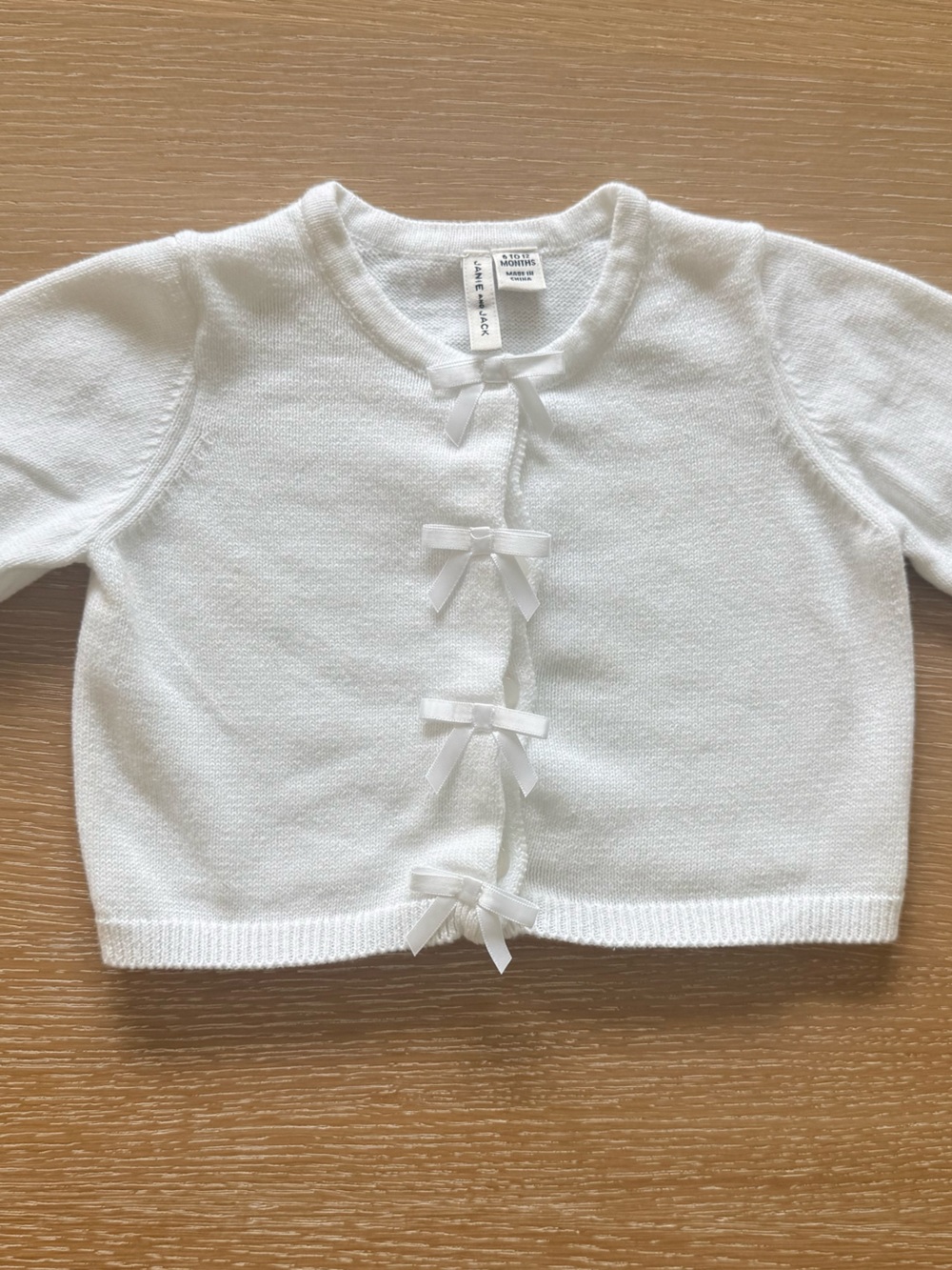 Janie and Jack - Classic White Baby Cardigan with Front Bow Detail - Size 6-12 M